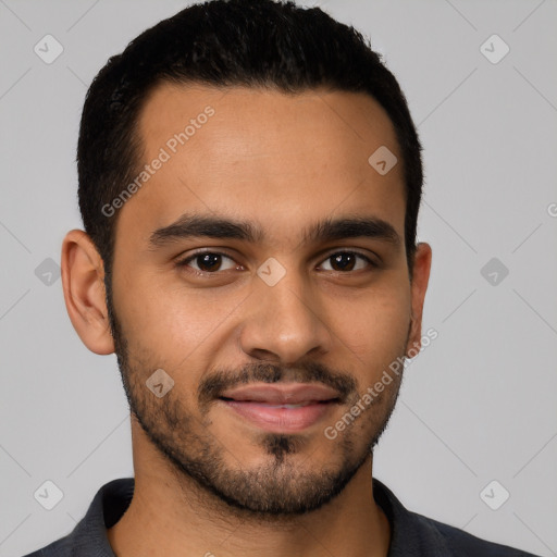 Joyful latino young-adult male with short  black hair and brown eyes