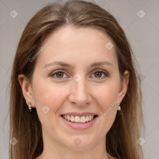 Joyful white adult female with long  brown hair and grey eyes