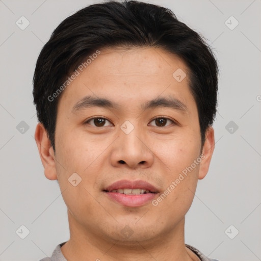 Joyful asian young-adult male with short  brown hair and brown eyes