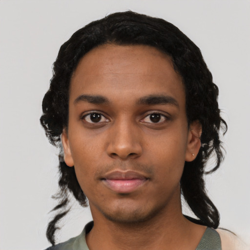 Neutral black young-adult male with short  black hair and brown eyes