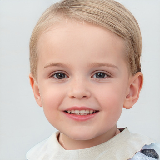 Joyful white child female with short  brown hair and blue eyes