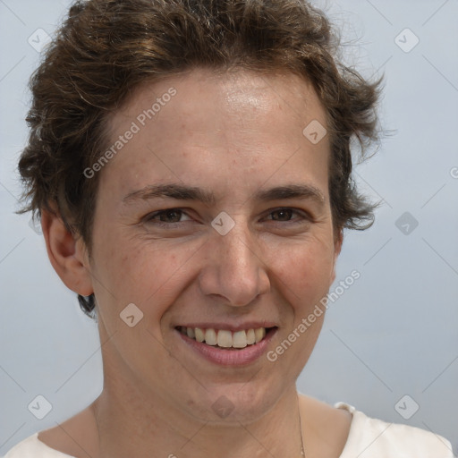 Joyful white adult female with short  brown hair and brown eyes