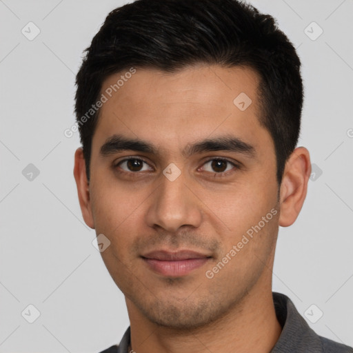 Joyful white young-adult male with short  black hair and brown eyes