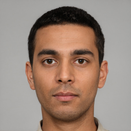 Neutral white young-adult male with short  black hair and brown eyes