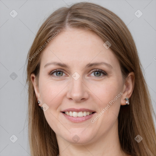 Joyful white young-adult female with long  brown hair and grey eyes