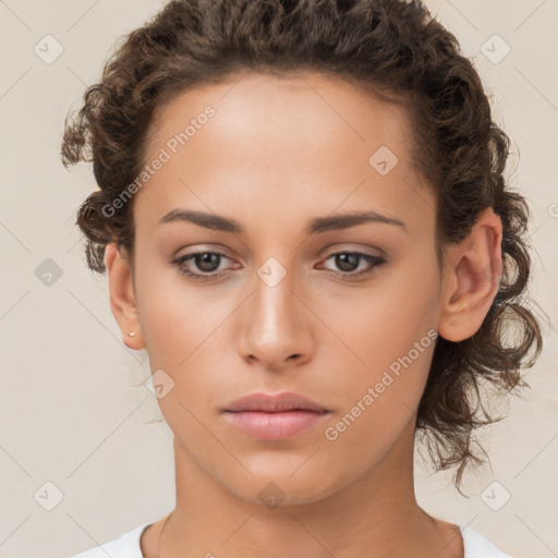 Neutral white young-adult female with short  brown hair and brown eyes