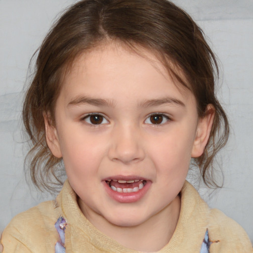 Joyful white child female with medium  brown hair and brown eyes