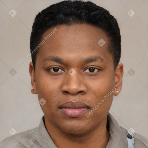 Joyful black young-adult male with short  black hair and brown eyes