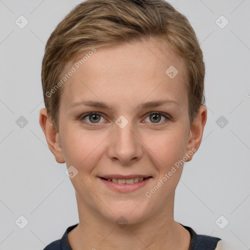 Joyful white young-adult female with short  brown hair and grey eyes