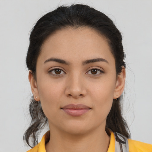 Neutral latino young-adult female with medium  brown hair and brown eyes