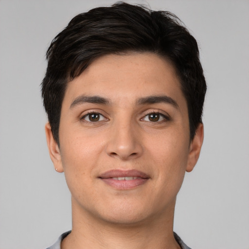 Joyful white young-adult male with short  brown hair and brown eyes