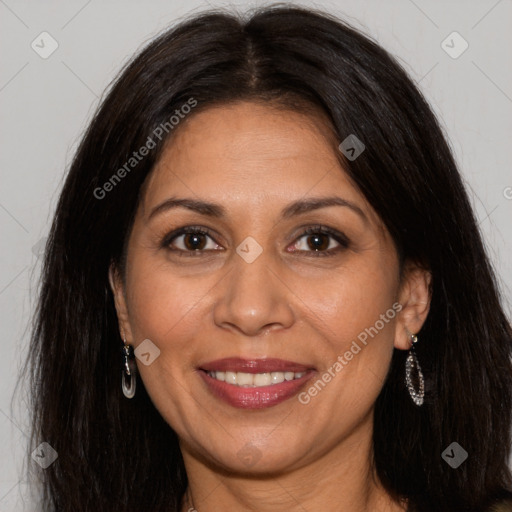 Joyful white adult female with long  brown hair and brown eyes