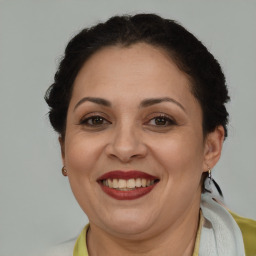 Joyful white adult female with short  brown hair and brown eyes