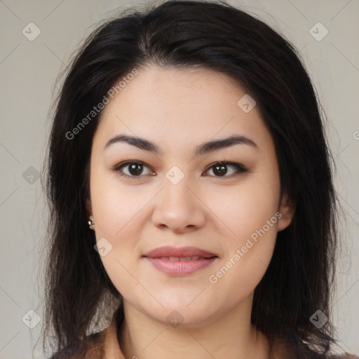 Joyful latino young-adult female with medium  brown hair and brown eyes