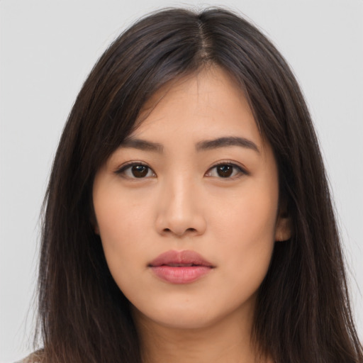 Neutral asian young-adult female with long  brown hair and brown eyes