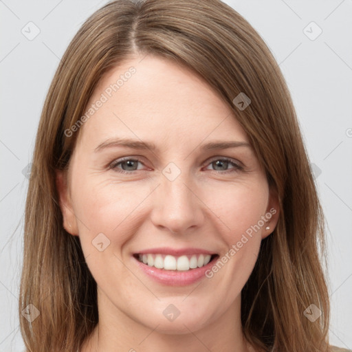 Joyful white young-adult female with long  brown hair and grey eyes