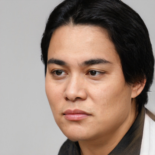 Neutral white young-adult male with medium  black hair and brown eyes