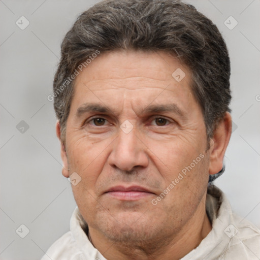 Joyful white middle-aged male with short  brown hair and brown eyes