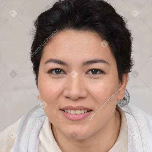 Joyful asian young-adult female with short  brown hair and brown eyes