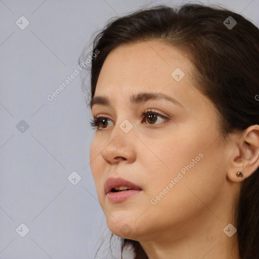 Neutral white young-adult female with short  brown hair and brown eyes