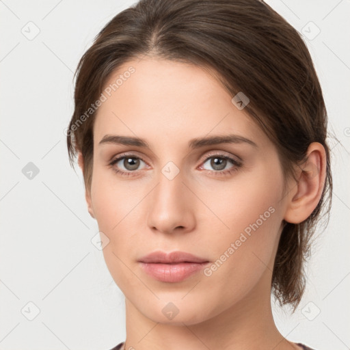 Neutral white young-adult female with medium  brown hair and grey eyes