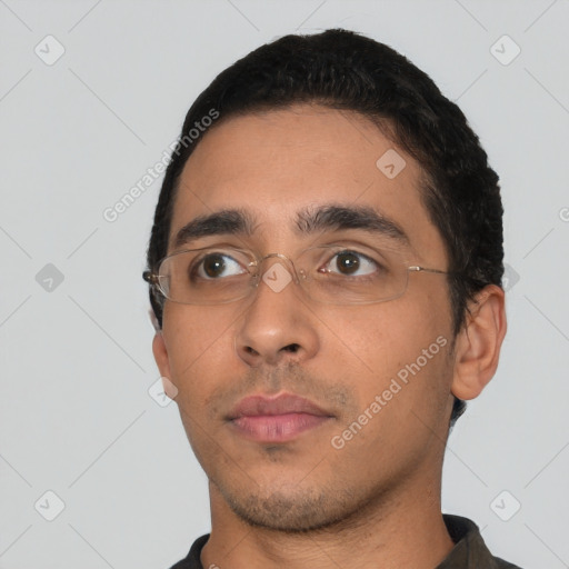 Neutral latino young-adult male with short  black hair and brown eyes