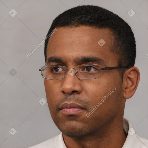 Neutral latino young-adult male with short  black hair and brown eyes