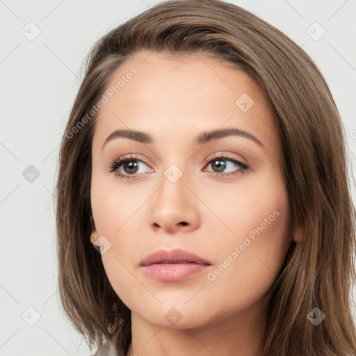 Neutral white young-adult female with long  brown hair and brown eyes