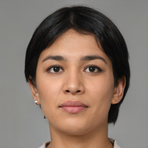 Neutral latino young-adult female with medium  black hair and brown eyes