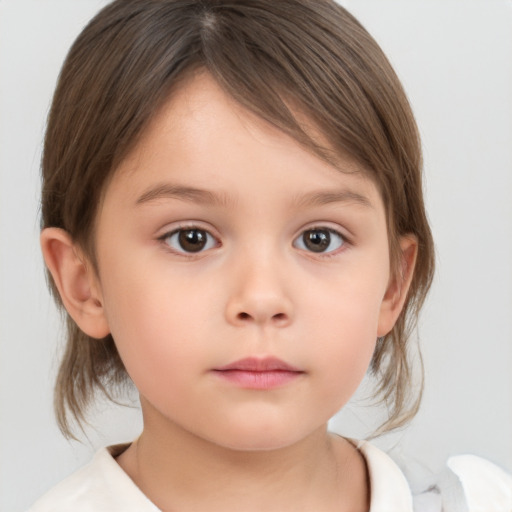 Neutral white child female with medium  brown hair and brown eyes