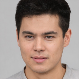 Neutral asian young-adult male with short  brown hair and brown eyes