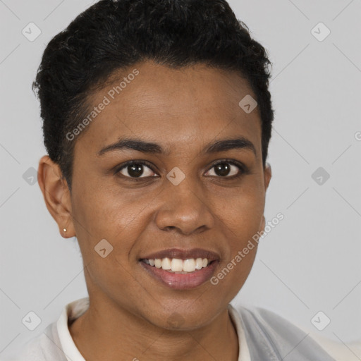 Joyful black young-adult female with short  brown hair and brown eyes