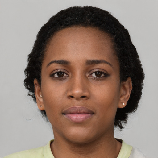 Neutral black young-adult female with short  black hair and brown eyes