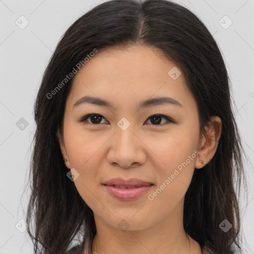 Joyful asian young-adult female with long  brown hair and brown eyes