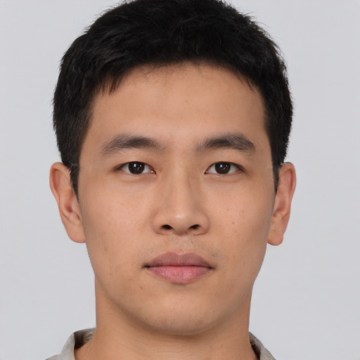Neutral asian young-adult male with short  brown hair and brown eyes