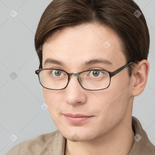 Neutral white young-adult male with short  brown hair and grey eyes