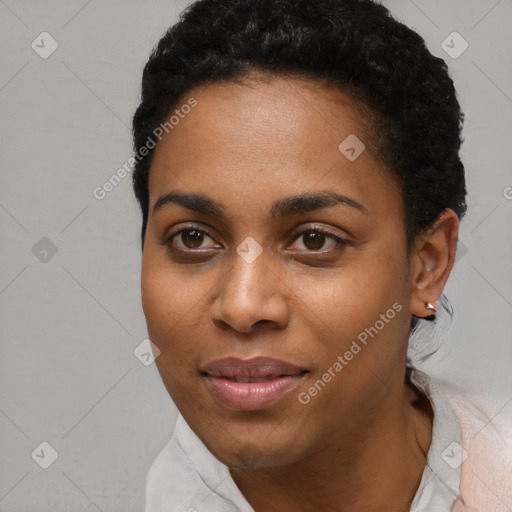 Joyful black young-adult female with short  black hair and brown eyes