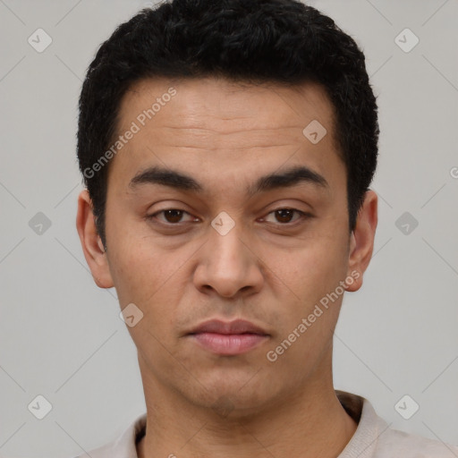 Neutral latino young-adult male with short  black hair and brown eyes