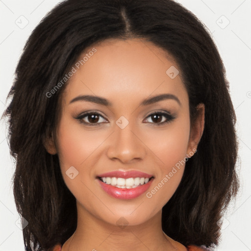 Joyful latino young-adult female with long  brown hair and brown eyes