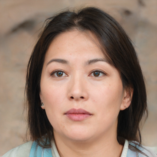 Neutral asian young-adult female with medium  brown hair and brown eyes