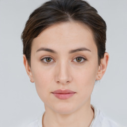 Neutral white young-adult female with short  brown hair and brown eyes