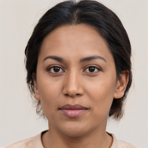 Neutral asian young-adult female with medium  brown hair and brown eyes