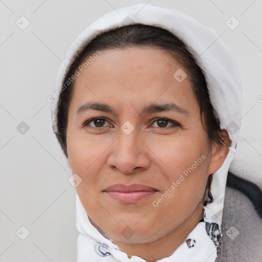 Joyful white adult female with short  brown hair and brown eyes