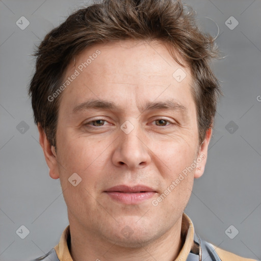 Joyful white adult male with short  brown hair and grey eyes
