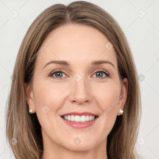 Joyful white young-adult female with long  brown hair and grey eyes