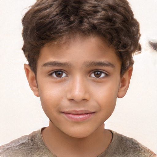 Joyful white child male with short  brown hair and brown eyes