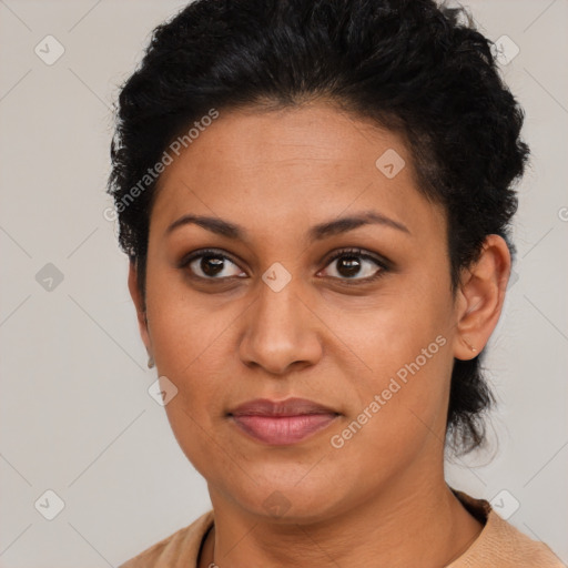 Joyful latino young-adult female with short  brown hair and brown eyes