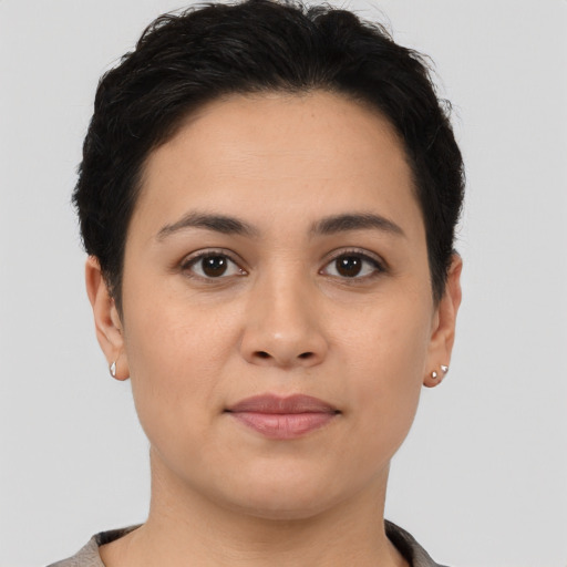 Joyful asian young-adult female with short  brown hair and brown eyes