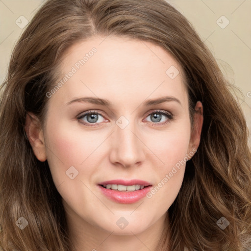 Joyful white young-adult female with long  brown hair and blue eyes