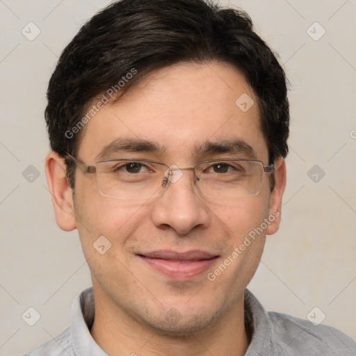 Joyful white adult male with short  brown hair and brown eyes